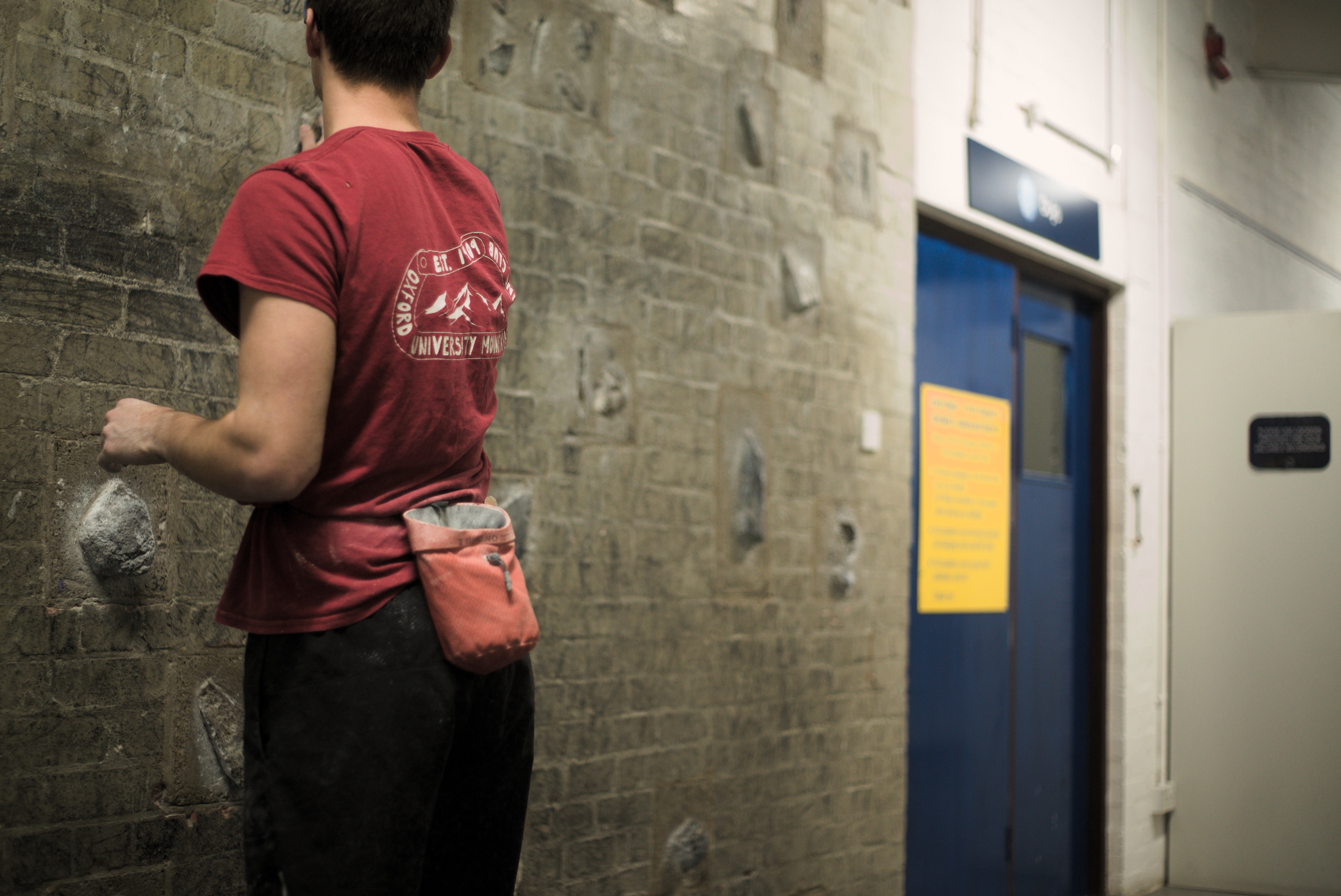 climber looking at the iffley wall