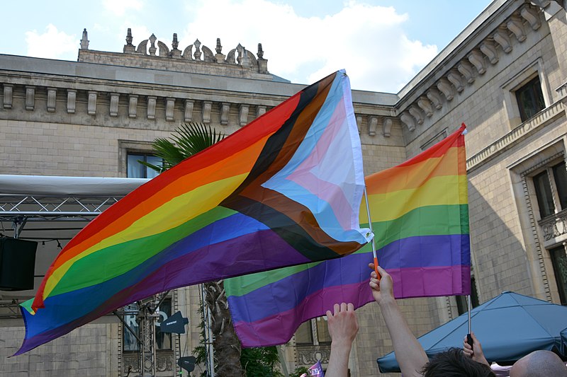 Progress Pride flag being waved at Warsaw Parade, 2021. Copyright Wikimedia Commons.