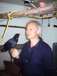 Alex Kacelnik with baby crow