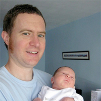 Joseph Talbot with his new-born daughter, Marcie