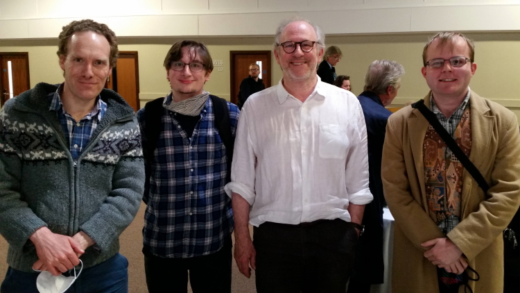Ian, Adam, and James with Peter Davison at Bedford Who Charity Convention 6 in 2021